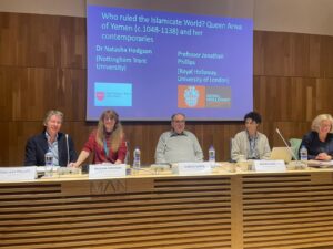 A panel of five people in front of a screen which reads "Who ruled the Islamicate World? Queen Arwa of Yemen (c. 1048-1138) and her contemporaries'.